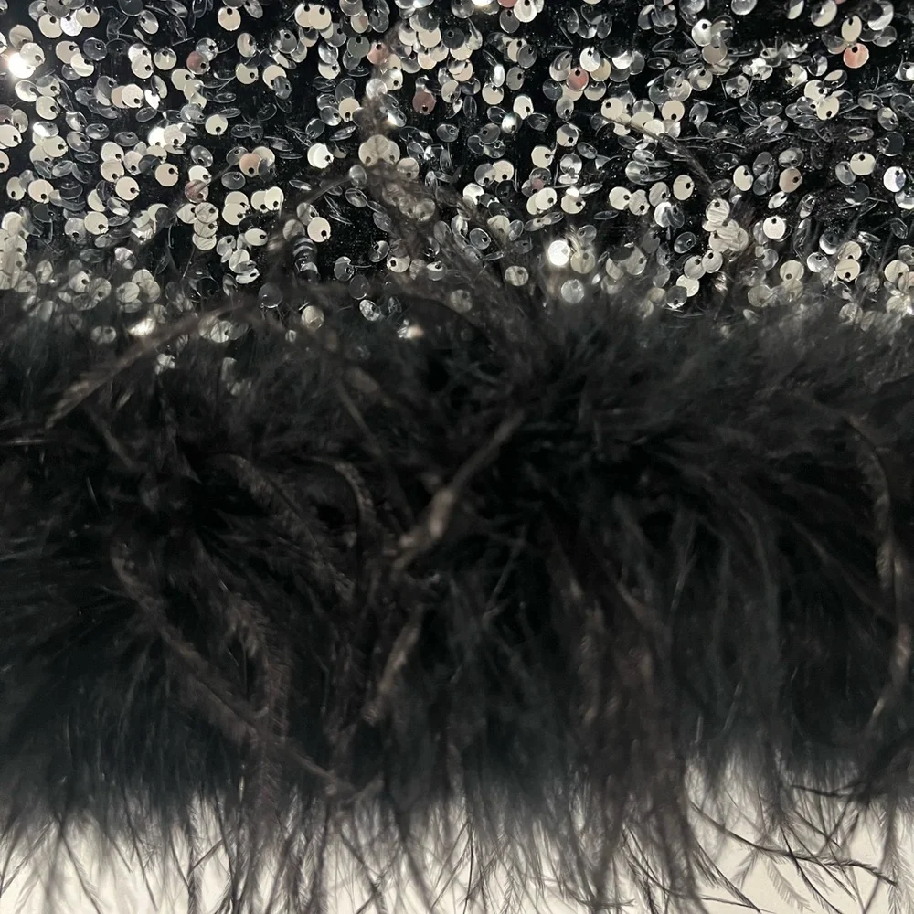 Better Be size M sequin midi dress with feather bottom. Black silver